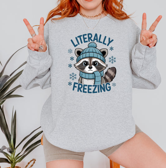 Literally Freezing Raccoon Sweatshirt | Funny Winter Crewneck | Cozy Cold Weather Graphic | Gildan 18500