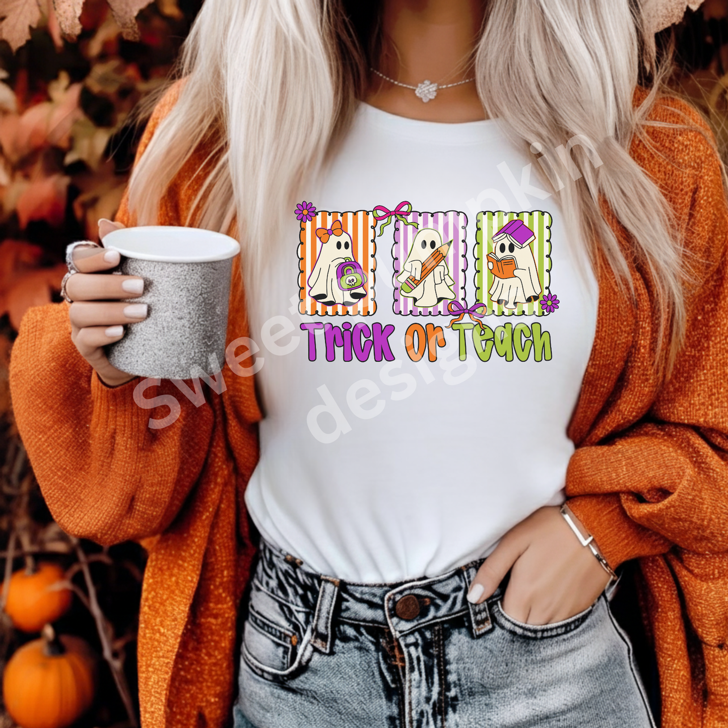 Halloween teacher tee featuring ghost design and Trick or Teach text, printed on soft Bella + Canvas shirt.