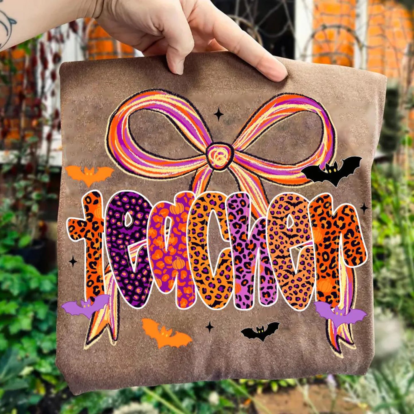 Soft Comfort Colors teacher tee with simple Halloween design for fall classroom outfits.