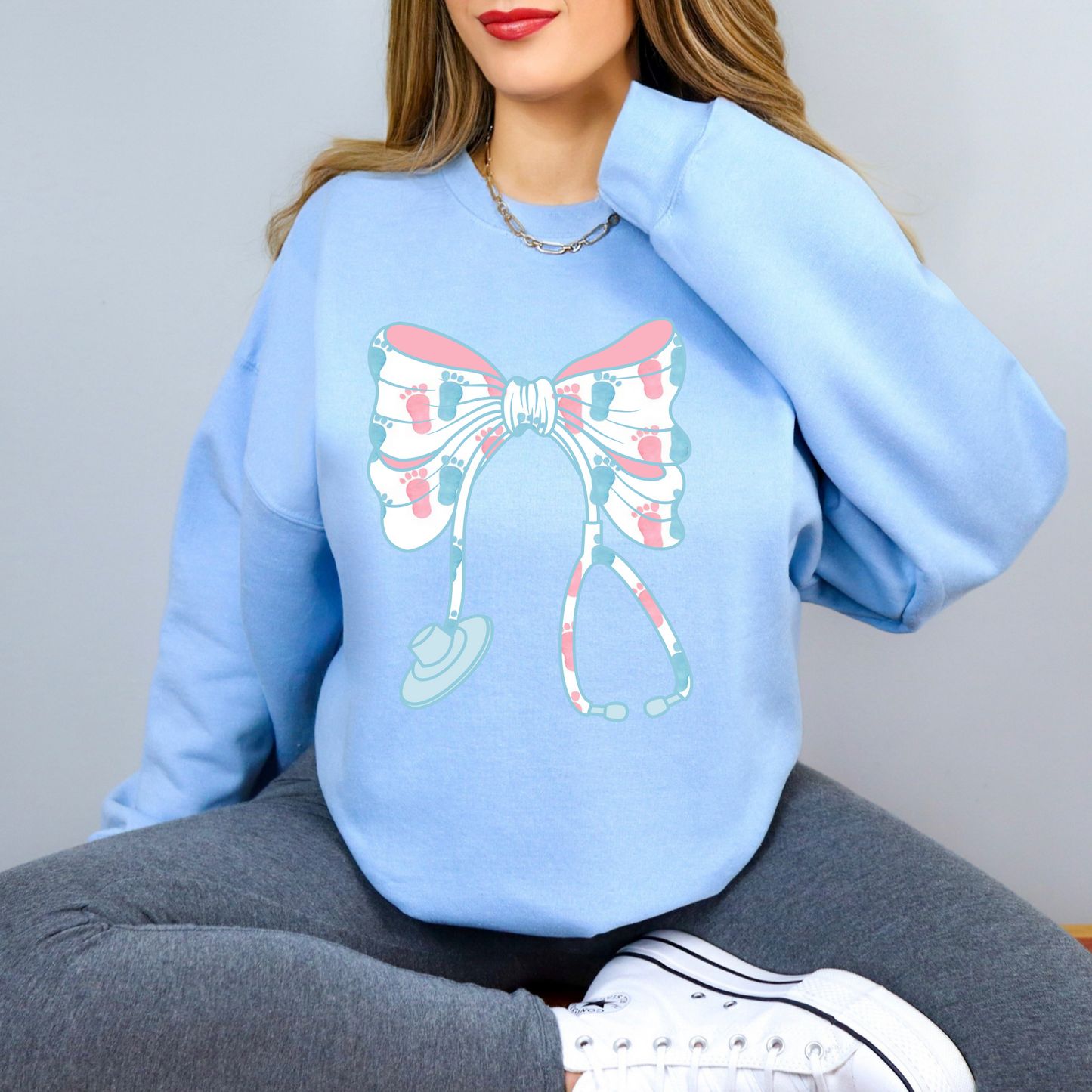 Labor and Delivery Nurse Baby Feet Bow Sweatshirt