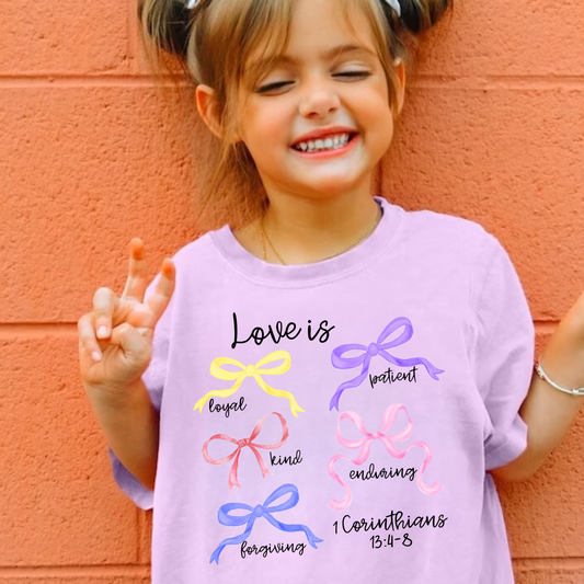 Christian love shirt for girls featuring a cute love design with bows, faith-based youth t-shirt perfect for church, Sunday wear, or Christian gifts for girls