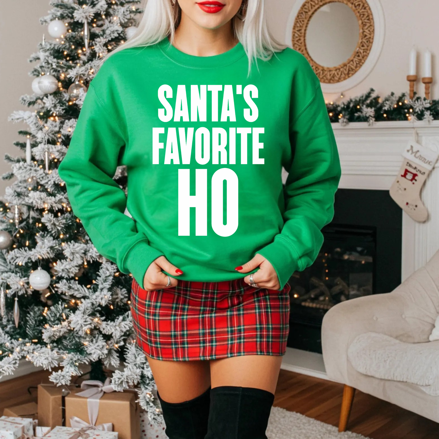 Funny Christmas sweatshirt saying Santa’s Favorite Ho on a Gildan 18000 crewneck