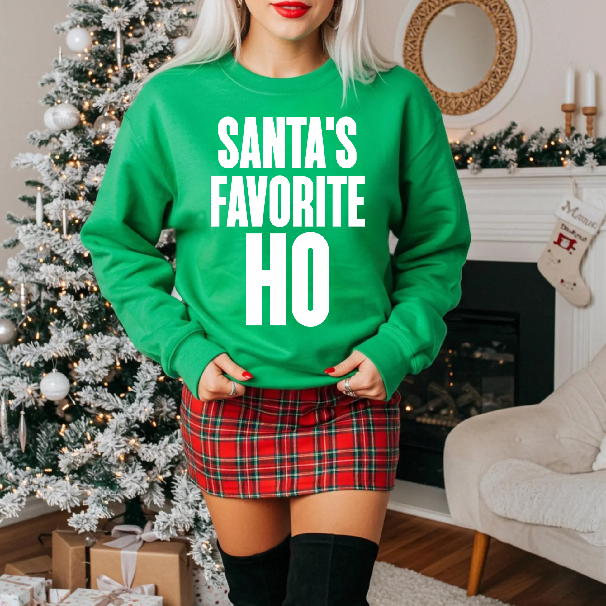 Funny Christmas sweatshirt saying Santa’s Favorite Ho on a Gildan 18000 crewneck