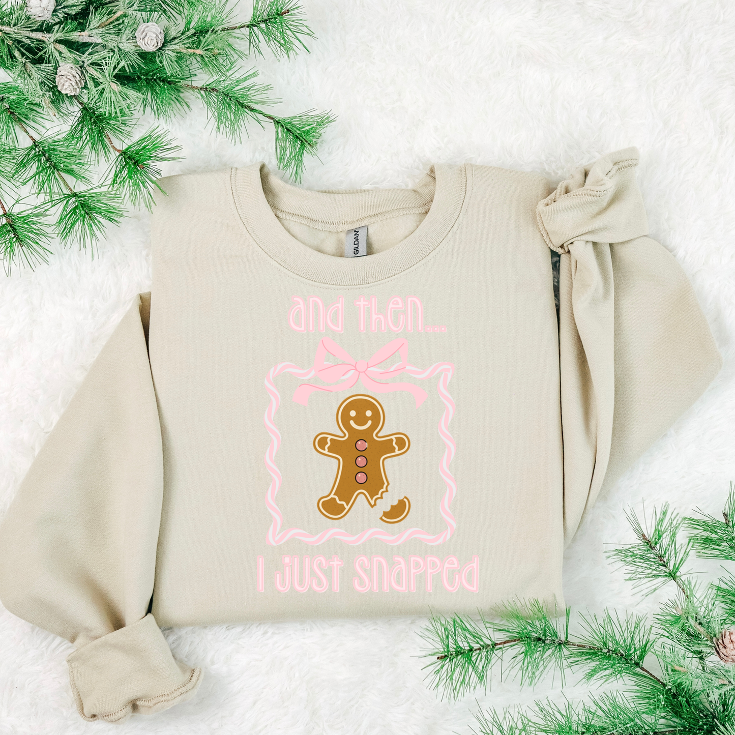 Funny gingerbread Christmas sweatshirt with “and then I just snapped” quote and broken-leg gingerbread graphic, on Gildan 18000 crewneck.