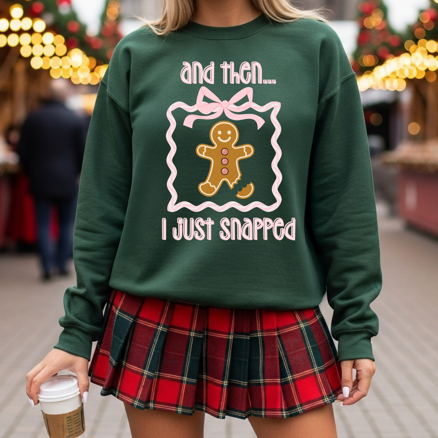 Funny gingerbread Christmas sweatshirt with “and then I just snapped” quote and broken-leg gingerbread graphic, on Gildan 18000 crewneck.