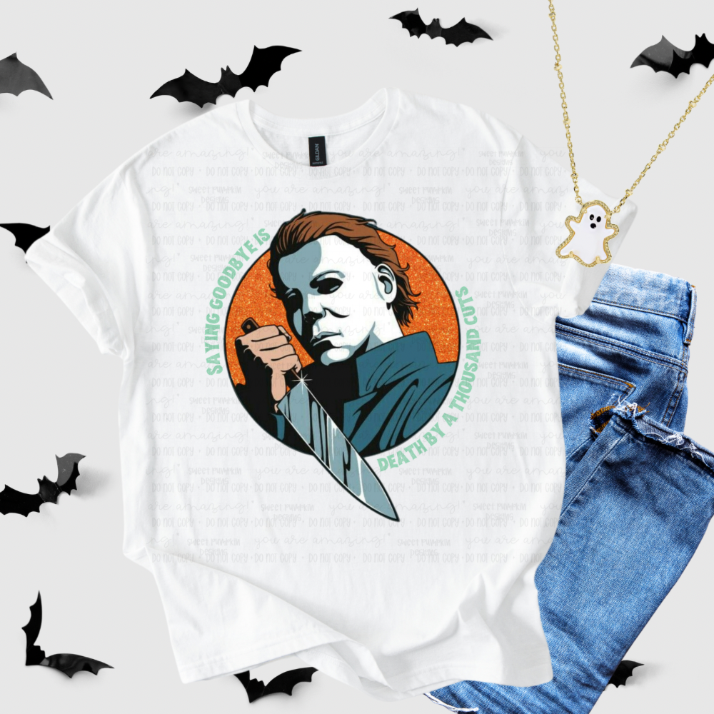 A THOUSAND CUTS | Bella Canvas Halloween Graphic Tee