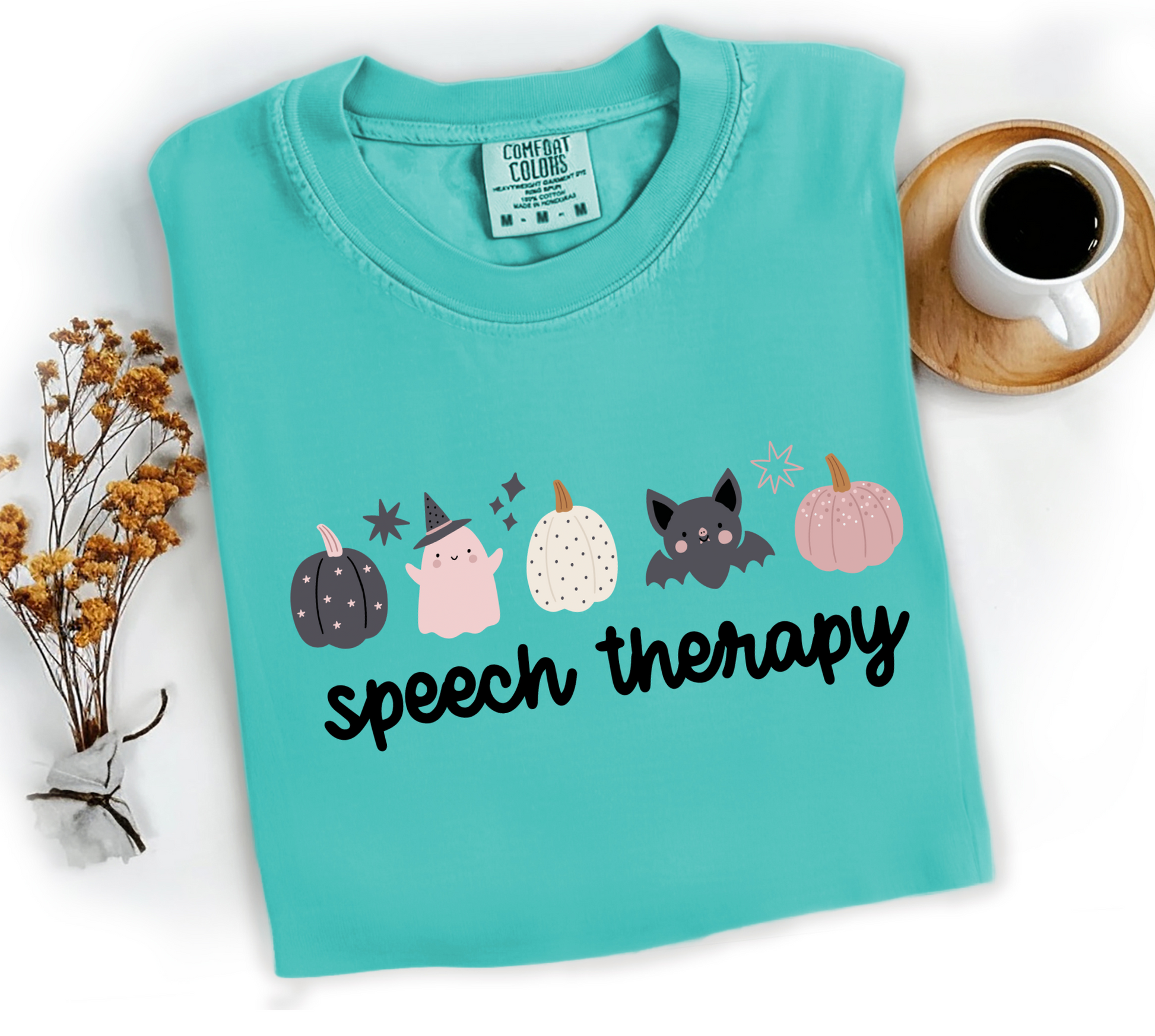 Teal Halloween SLP shirt with pumpkin design for speech therapist.