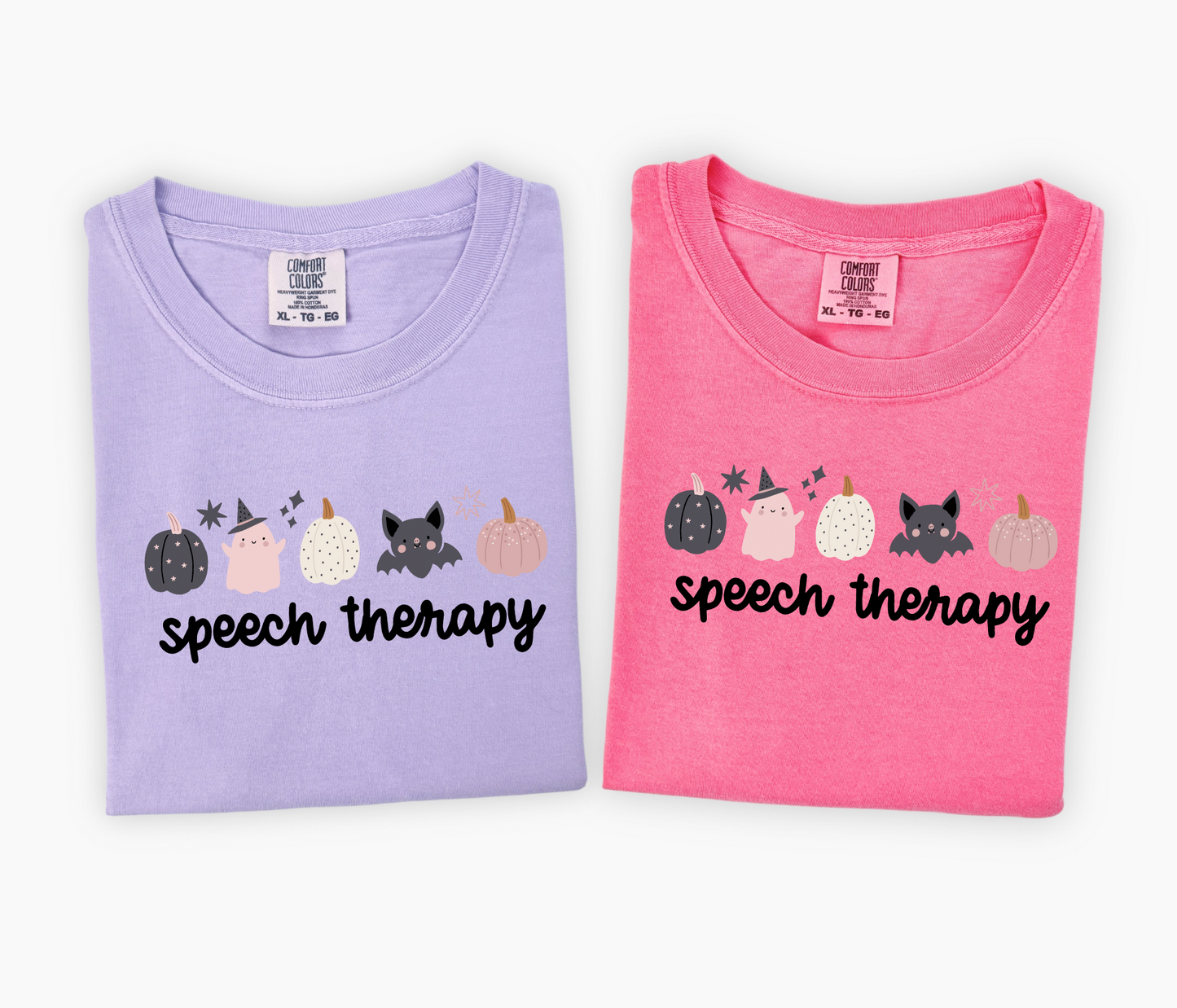 Two folded T-shirts, one violet and one pink withHalloween SLP shirt with pumpkin design for speech therapist.