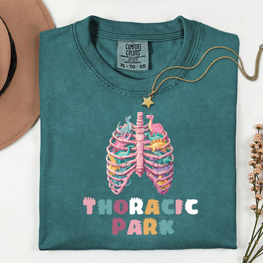 Funny Thoracic Park dinosaur shirt for respiratory therapists on Comfort Colors tee