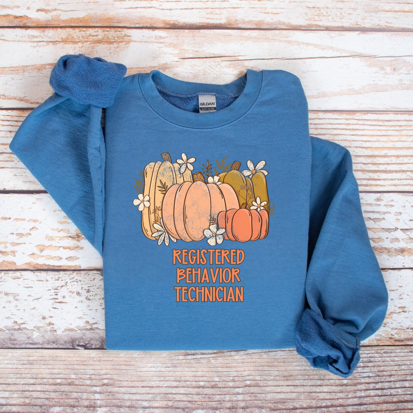 Fall Halloween pumpkin Registered Behavioral Technician sweatshirt Gildan 18000 crewneck