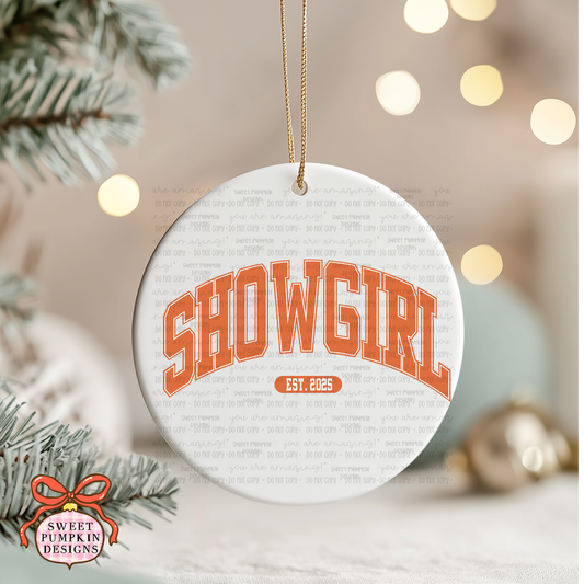 ORANGE SHOW GIRL CERAMIC CHRISTMAS ORNAMENT
