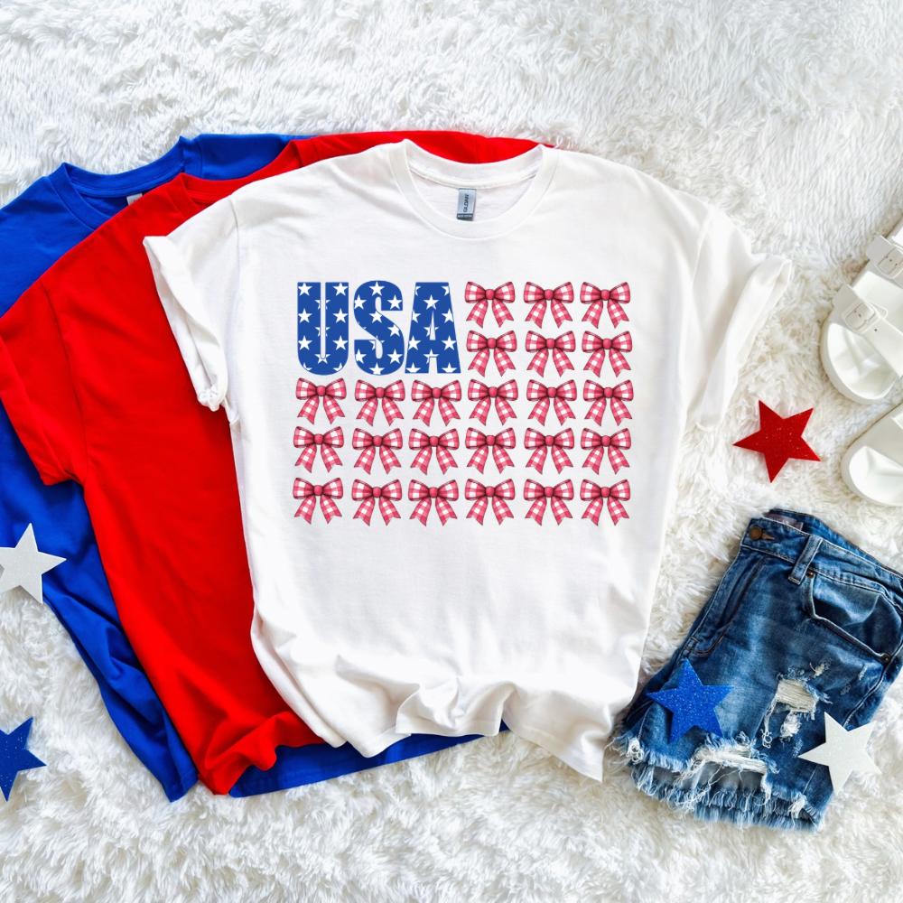 USA BOW SHIRT | Women’s Patriotic Shirt | Gildan Softstyle Fourth of July Tee | Cute Summer Graphic Tee for Women - LIMITED RELEASE
