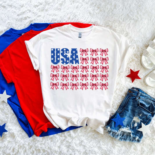 USA BOW SHIRT | Women’s Patriotic Shirt | Gildan Softstyle Fourth of July Tee | Cute Summer Graphic Tee for Women - LIMITED RELEASE