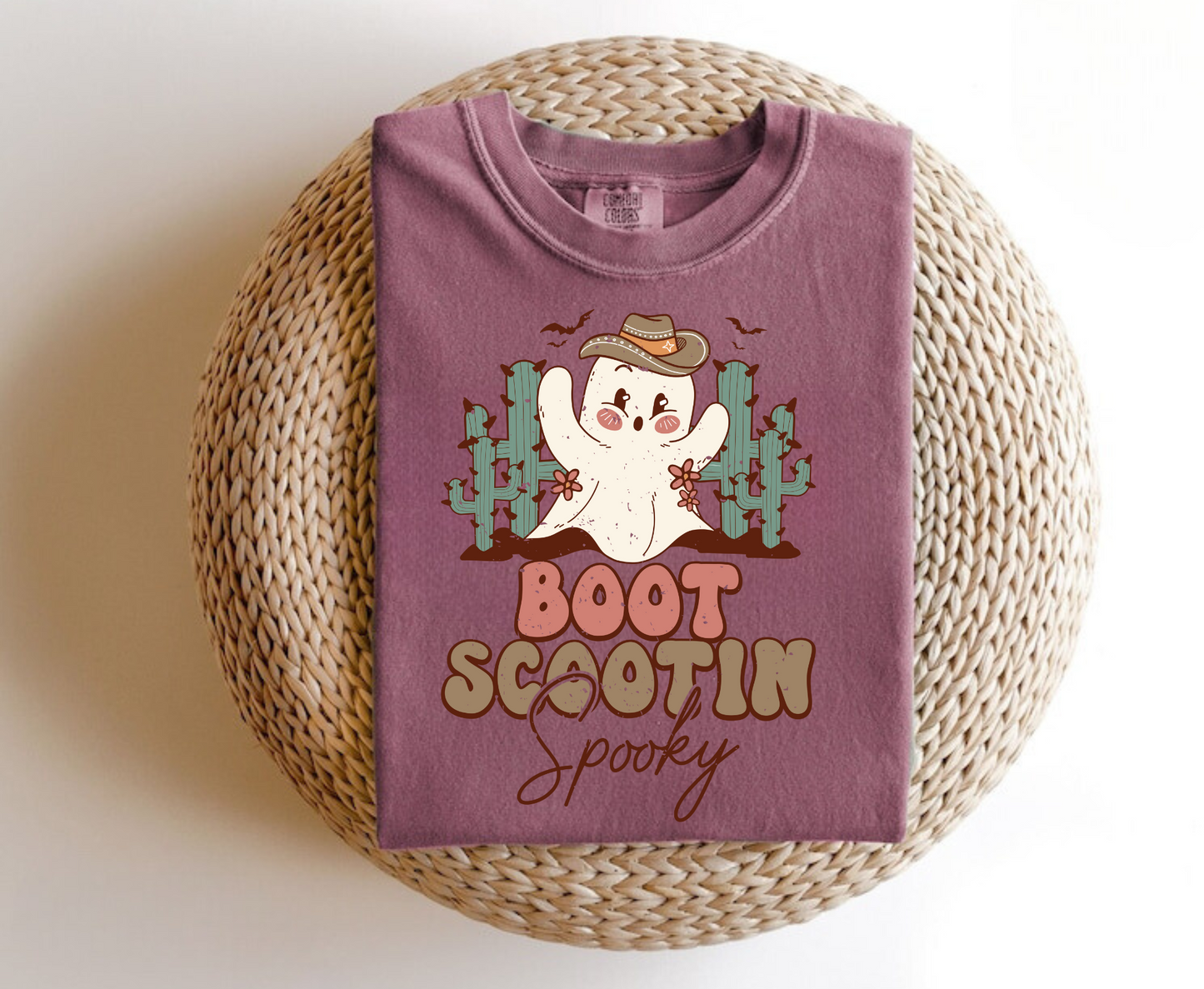 Trendy oversized preppy Western Halloween shirt with "Boot Scootin' Spooky" cowboy design - Embrace the spirit of Western Halloween and autumn with this stylish and playful shirt featuring a ghost cowboy. Perfect blend of retro and trendy fashion for your fall festivities.