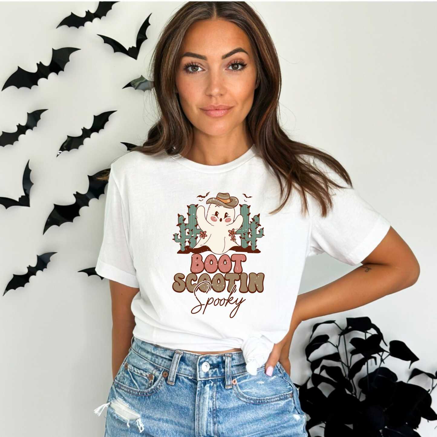 Trendy oversized preppy Western Halloween shirt with "Boot Scootin' Spooky" cowboy design - Embrace the spirit of Western Halloween and autumn with this stylish and playful shirt featuring a ghost cowboy. Perfect blend of retro and trendy fashion for your fall festivities.