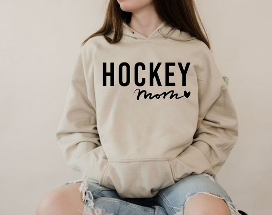 Cozy hockey mom hoodie - Stay warm and stylish on game day with this comfortable sweatshirt designed for hockey moms and hockey mamas. Perfect for supporting players in chilly rinks or cheering from the stands.