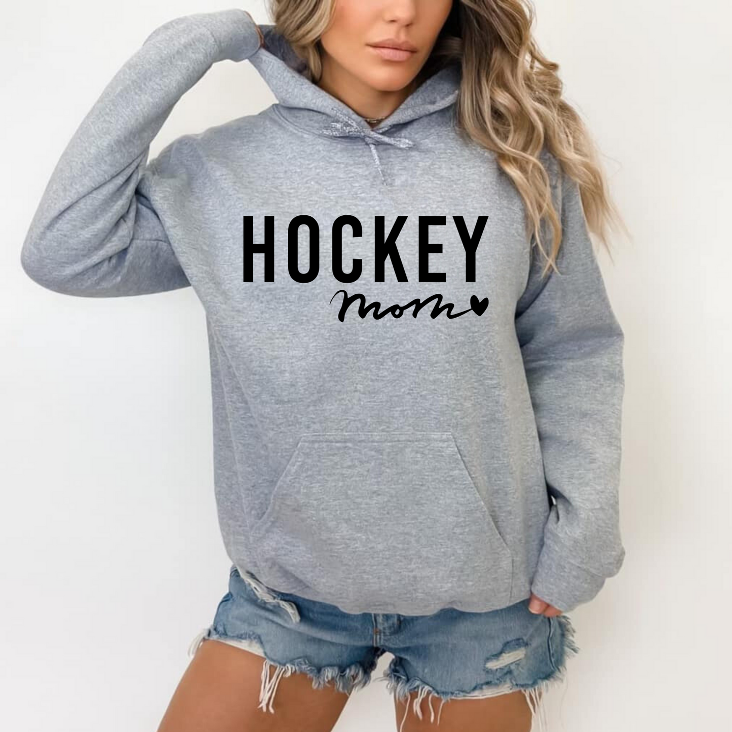 Cozy hockey mom hoodie - Stay warm and stylish on game day with this comfortable sweatshirt designed for hockey moms and hockey mamas. Perfect for supporting players in chilly rinks or cheering from the stands.