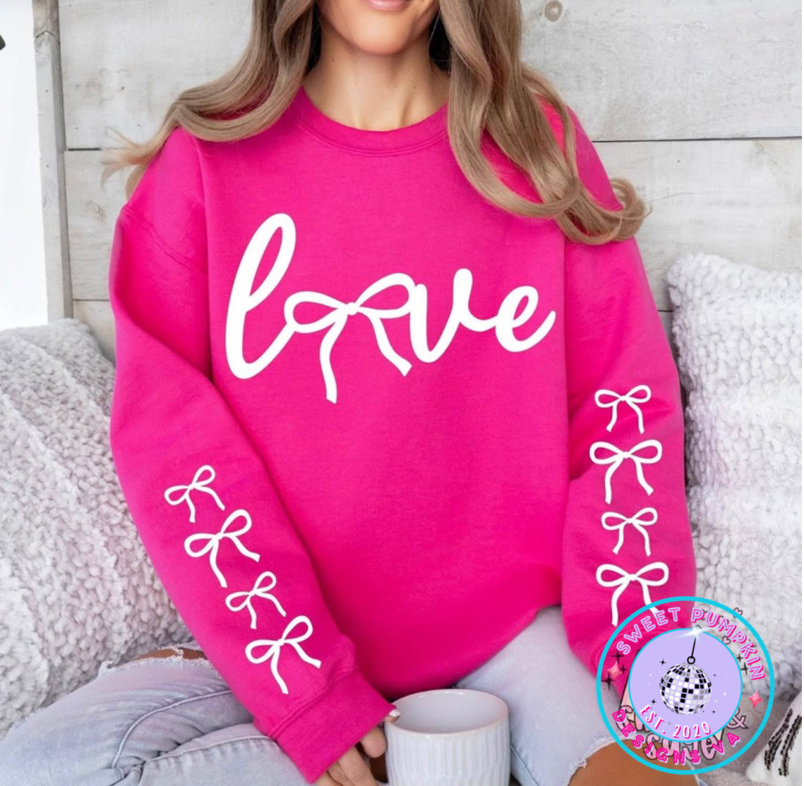 love sweatshirt with bow sleeve accents, cute graphic sweatshirt women cozy outfit, bow sleeve love sweatshirt casual wear, feminine sweatshirt with bows, cozy gift sweatshirt for her