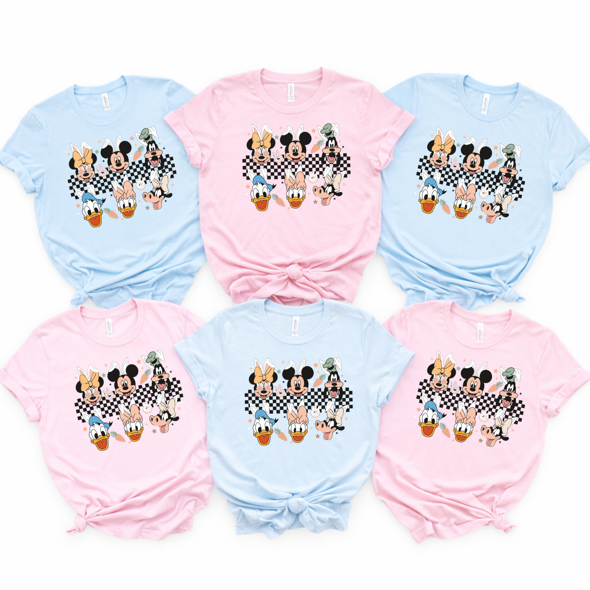matching family Easter shirts in pastel blue and pink laid flat for spring park vacation outfits