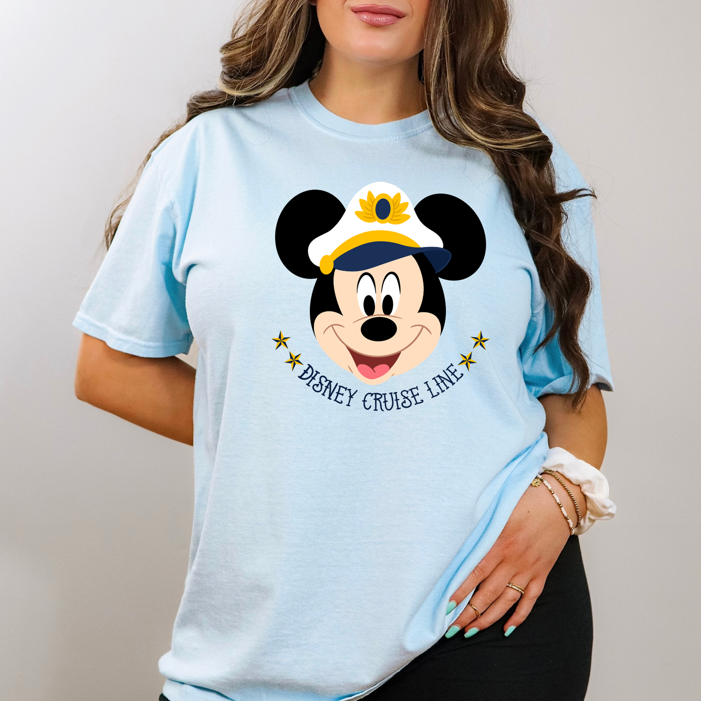 Woman wearing a Comfort Colors mouse cruise shirt styled for a cruise vacation outfit
