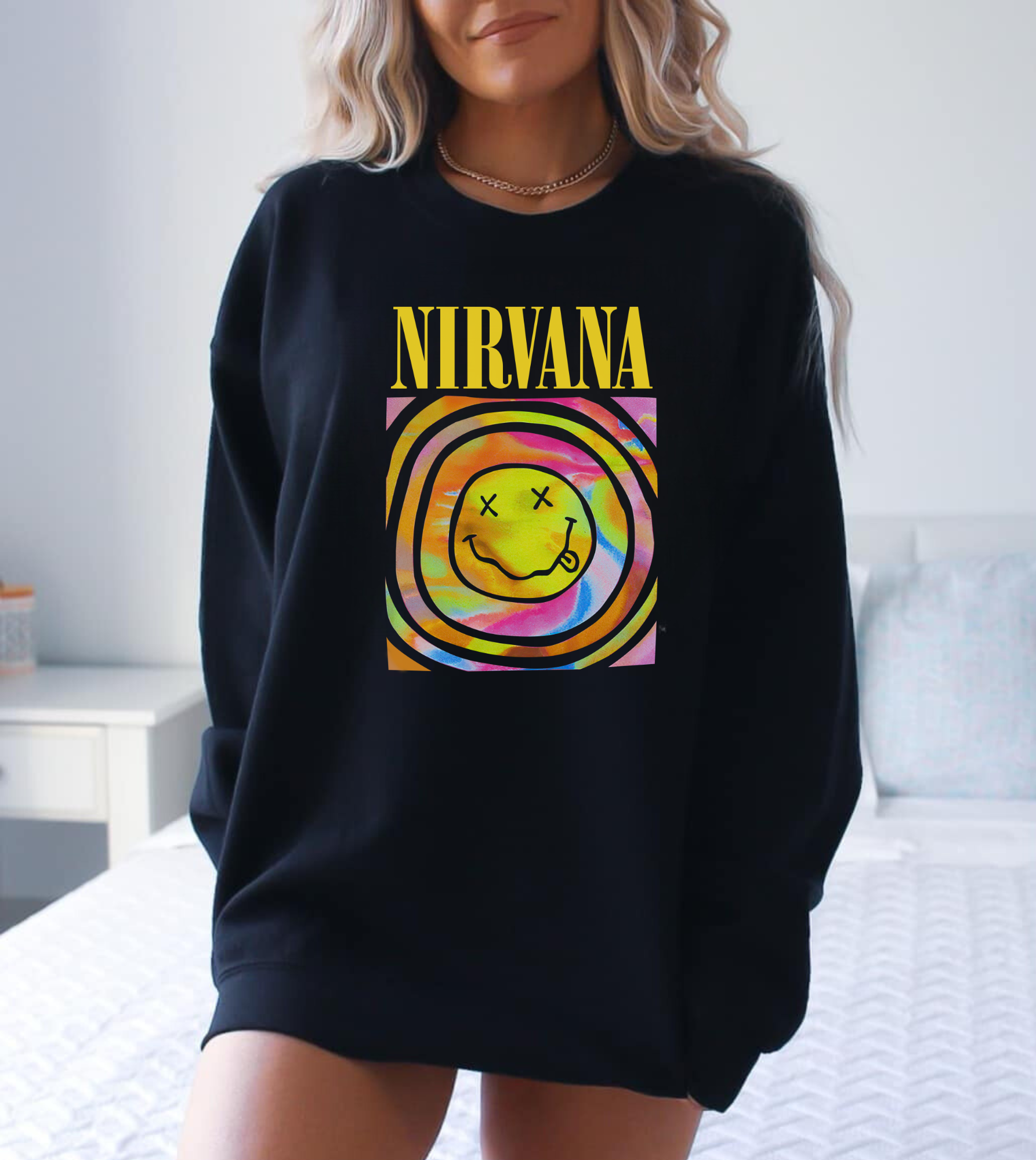 A Pink Preppy Nirvana Crewneck Sweatshirt, adding a stylish twist to casual comfort with a trendy y2k graphic. The oversized sweatshirt features a cute and unique preppy take on the iconic band sweatshirt.