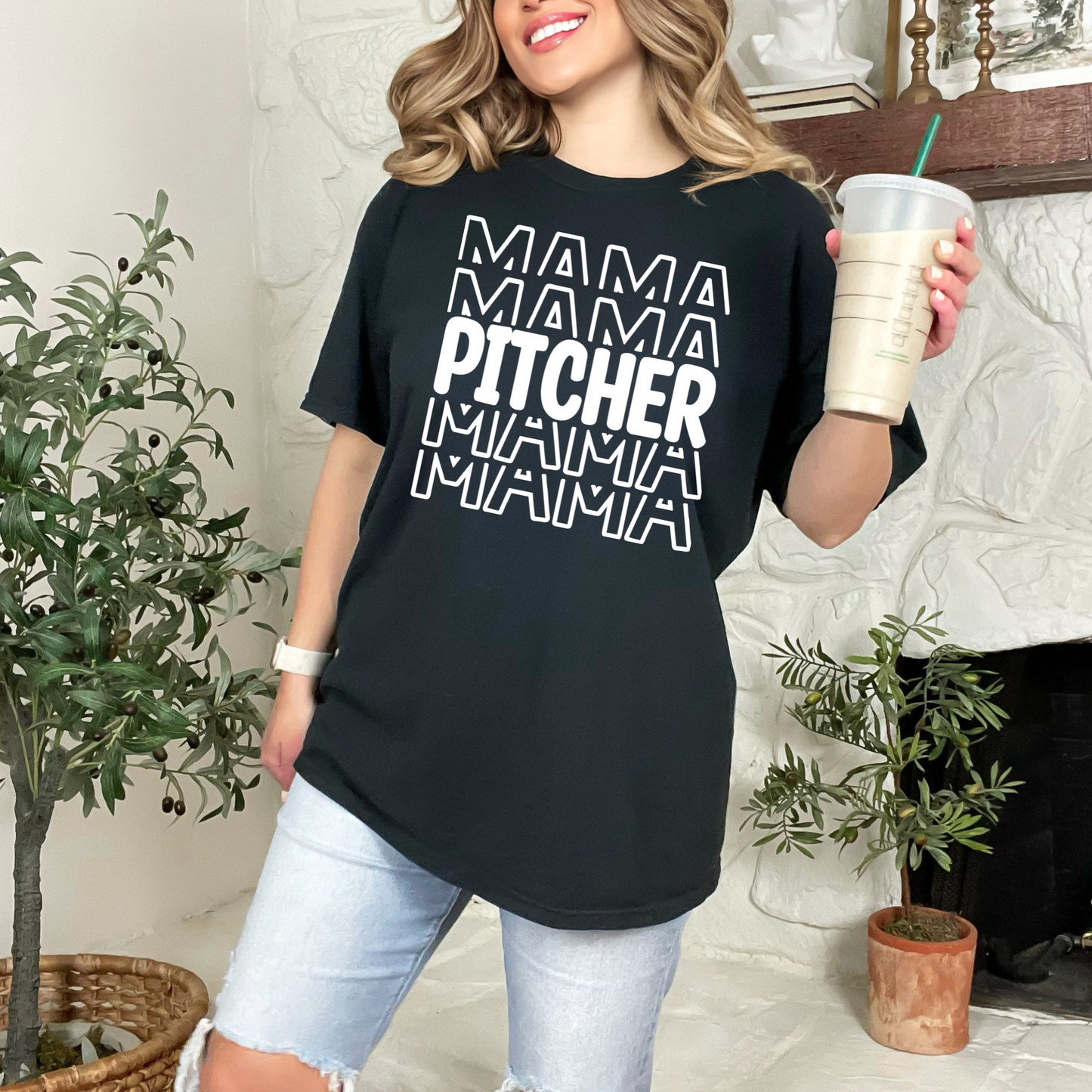 A stylish baseball mom shirt with the text 'Pitcher Mama', perfect for game day and showing off your love for baseball. The shirt features a comfortable fit and is a great choice for a mom outfit at the baseball game.