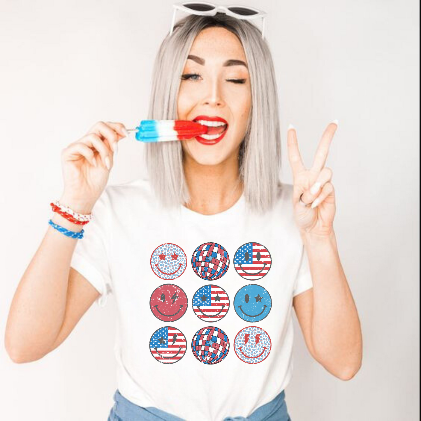 Retro Patriotic T-Shirt for women with a disco ball and smiley face design in red, white, and blue colors.