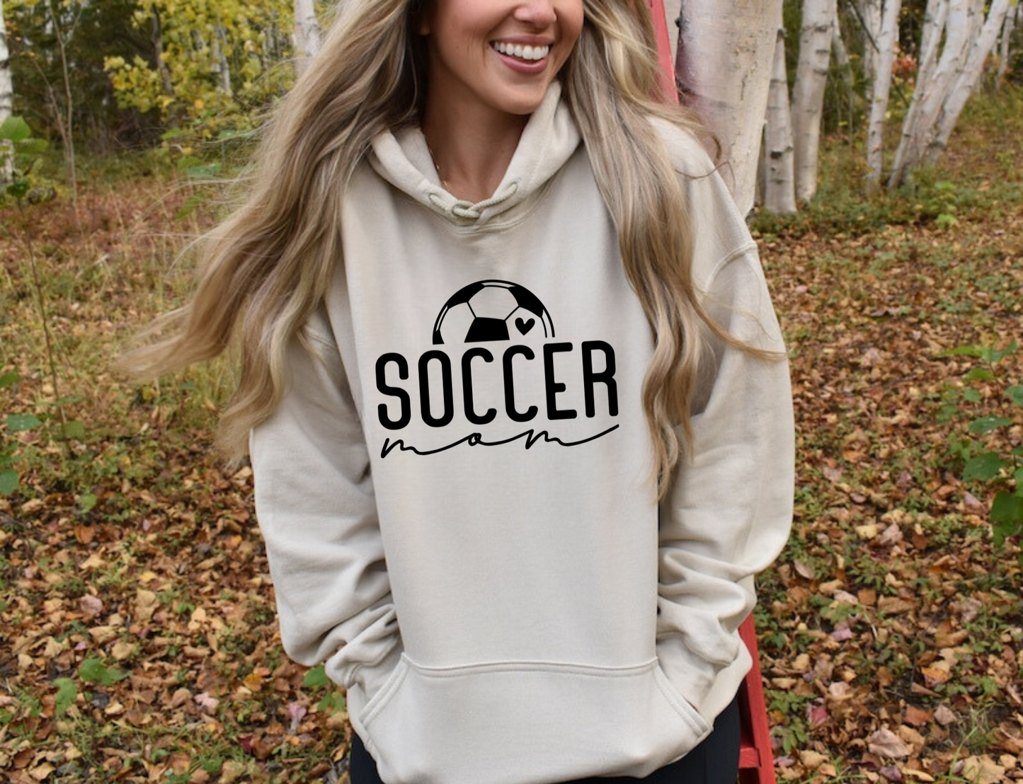 Cozy soccer mom hoodie sweatshirt - Stay warm and comfortable while supporting your soccer player at the games. Perfect for stylishly cheering on your athlete as a soccer mama.