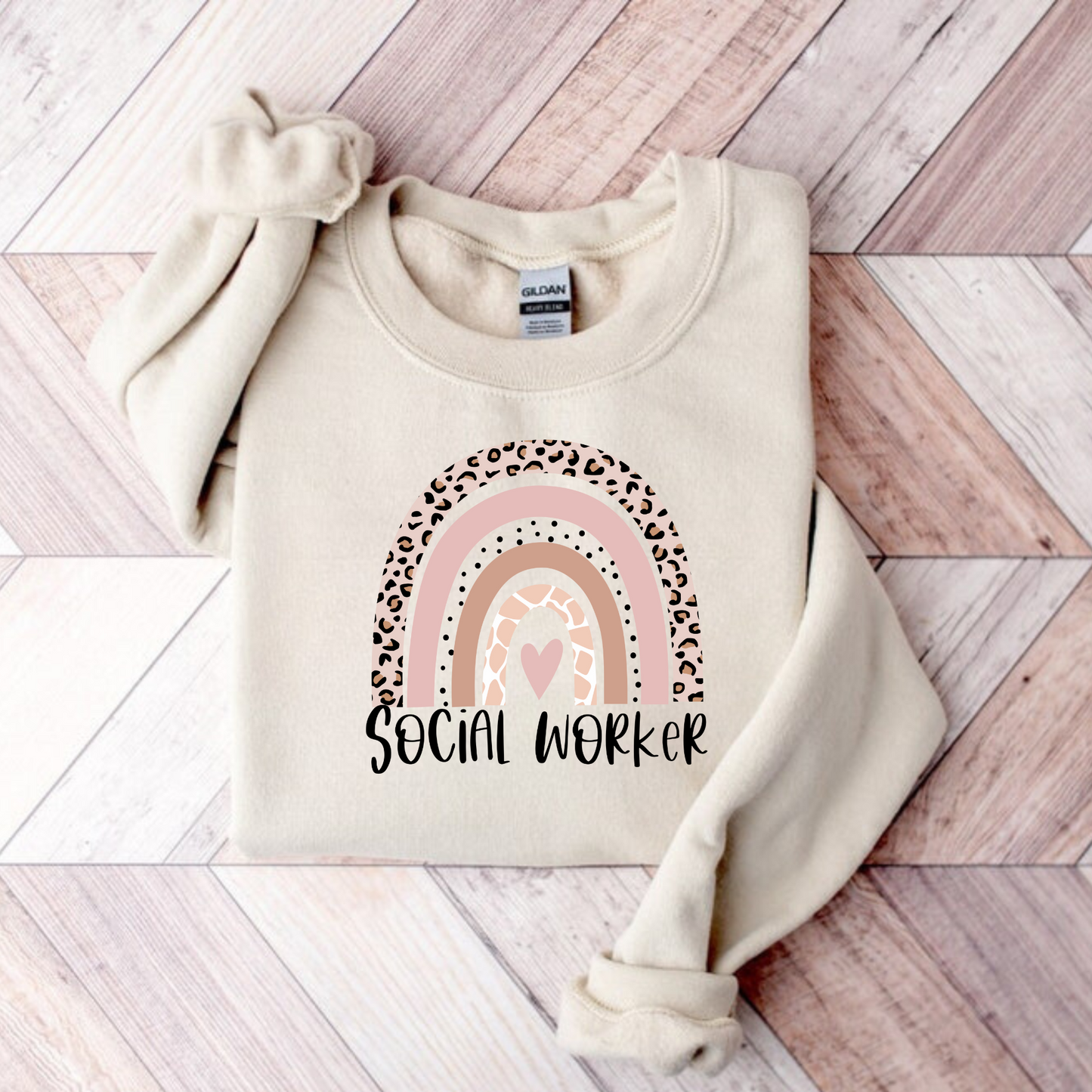 A boho rainbow social worker crewneck sweatshirt. This cozy sweatshirt is perfect for social workers and MSW graduates, featuring a vibrant boho rainbow design. Shop now and showcase your dedication to the field of social work with this stylish crewneck sweatshirt.
