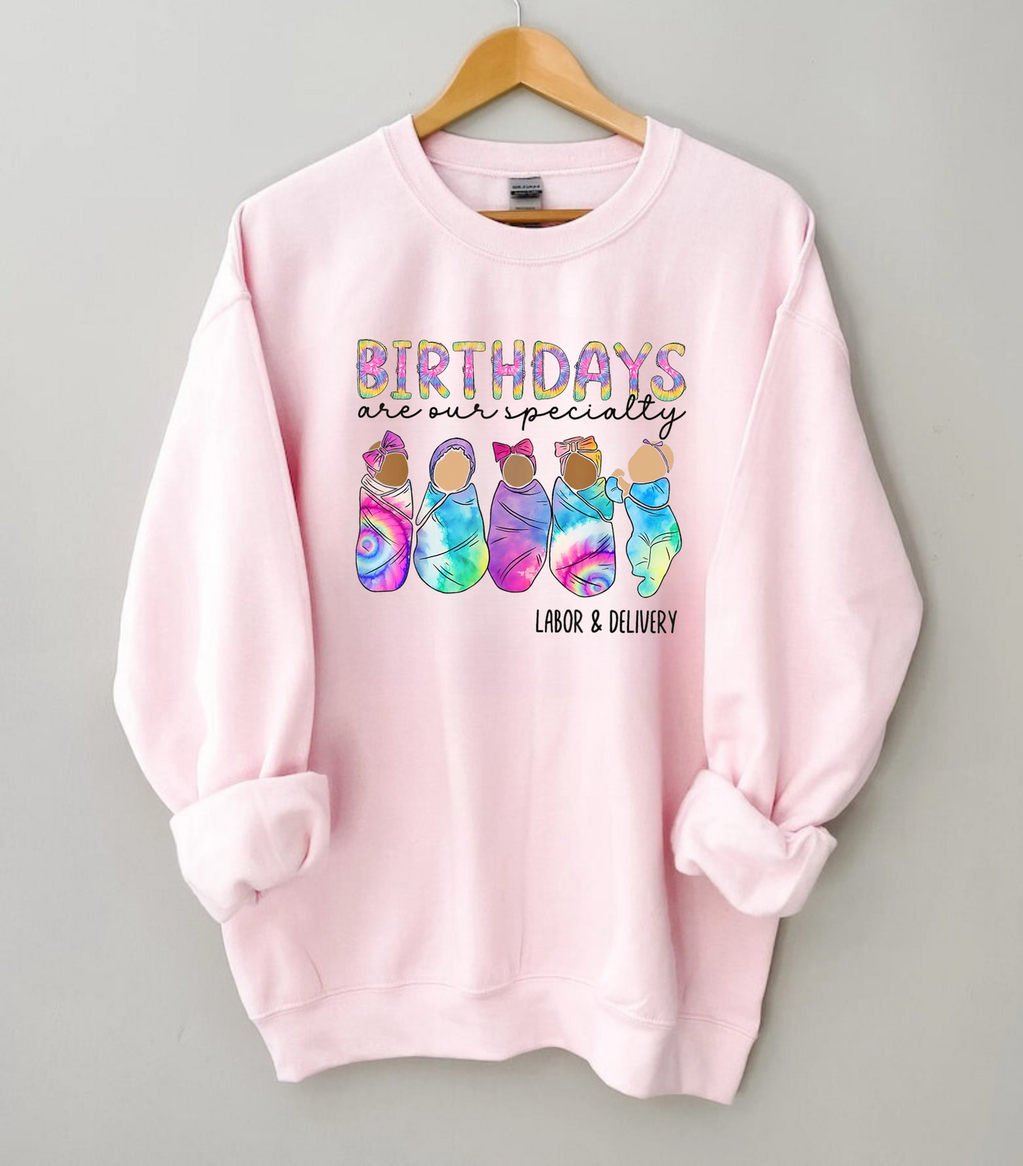 Make a statement with our Labor and Delivery Nurse Crewneck Sweatshirt. This cute nurse sweater is perfect for RNs and registered nurses working in labor and delivery (L&D). Elevate your nurse work outfit with this stylish and comfortable OB Nurse sweatshirt. Shop now and add this unique nurse sweatshirt to your collection of nurse clothes. Get ready to rock your nurse outfit for work as an L&D nurse!