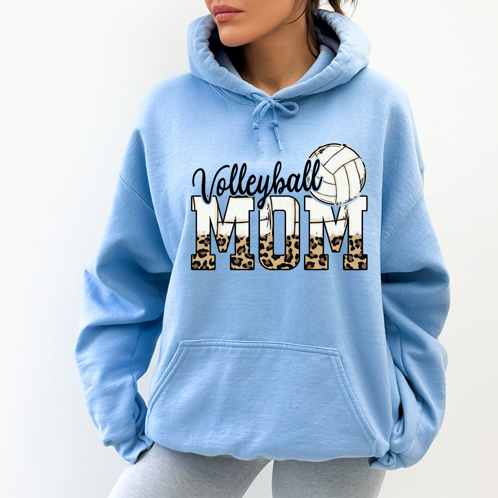 Cozy volleyball mom hoodie sweatshirt - Show your support in comfort with this essential hoodie perfect for volleyball games. Stay cozy and stylish as a proud volleyball mama.