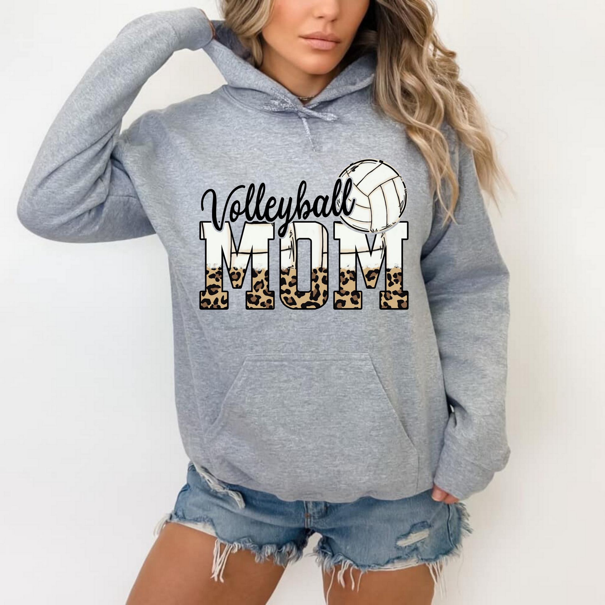 Cozy volleyball mom hoodie sweatshirt - Show your support in comfort with this essential hoodie perfect for volleyball games. Stay cozy and stylish as a proud volleyball mama.